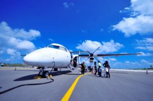 people boarding a plane